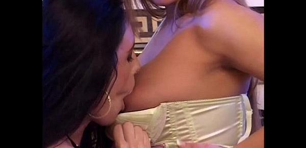  Two hot lesbians play with a sex toy licking their pussy each other